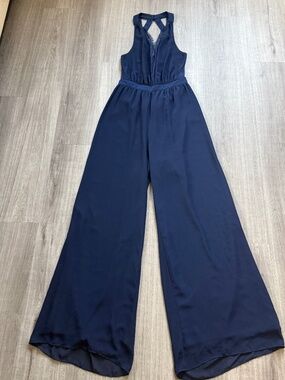 BCBGgeneration Navy V-Neck, Lace Detail, Open Back Jumpsuit (size 10)